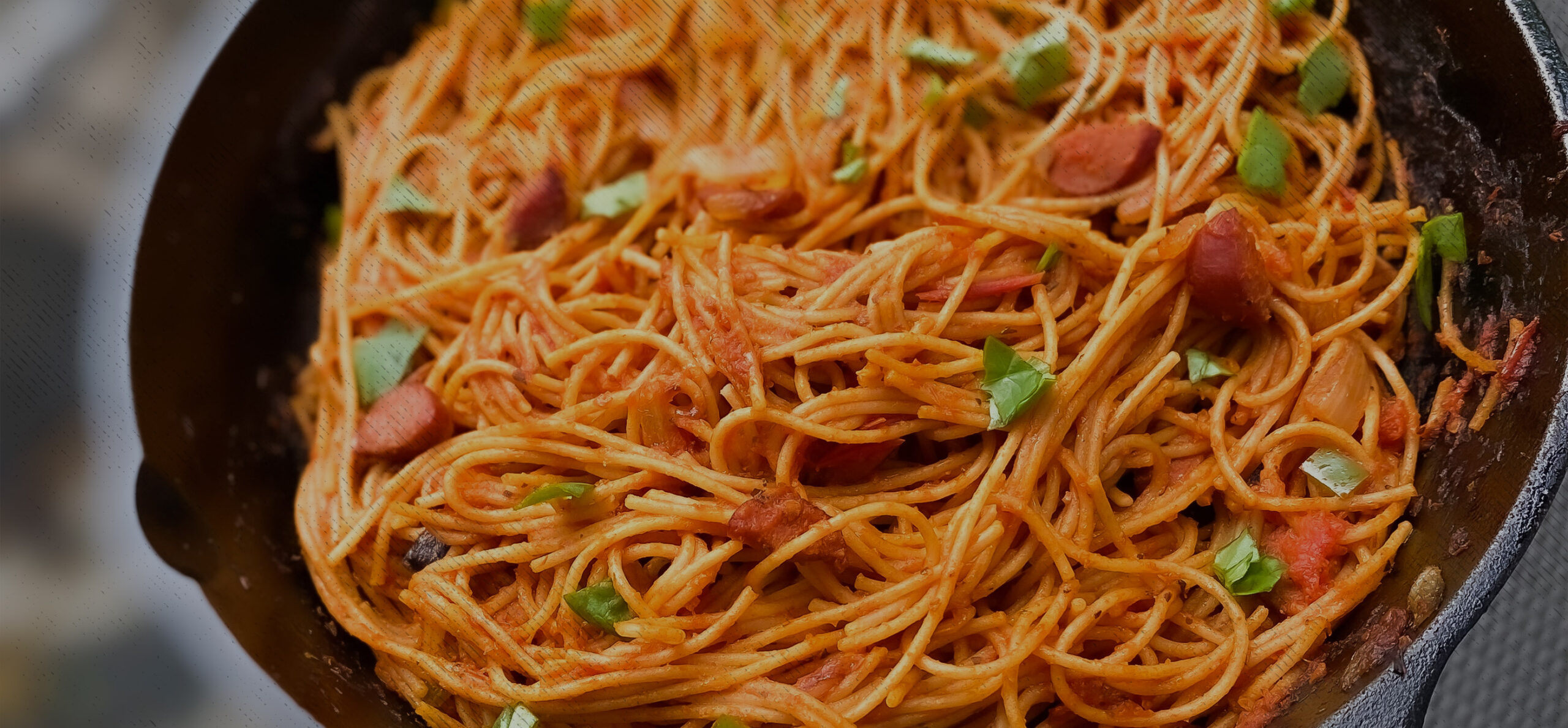 Haitian Style Spaghetti with Beef Hot Dogs